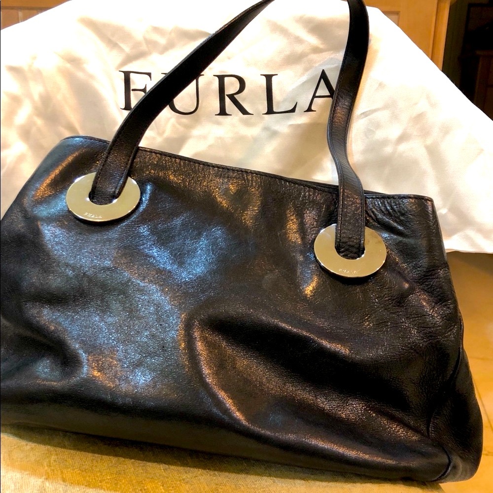Furla black leather purse. In very good condition.